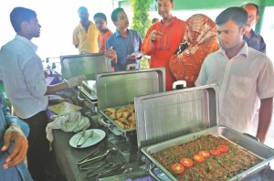 People throng Rodela Bikel, an Iftar outlet, to buy delicacies in MA Aziz Stadium Market of Chittagong city. Photo: Star